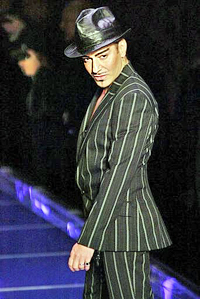 John Galliano sent models down the catwalk in their underwear at the first day of Paris' Couture Fashion Week 